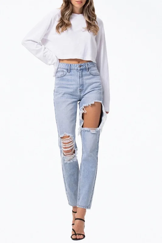 Modern Women's Fashion with Vintage Touches High-Rise Distressed Tapered Jeans In Light Blue